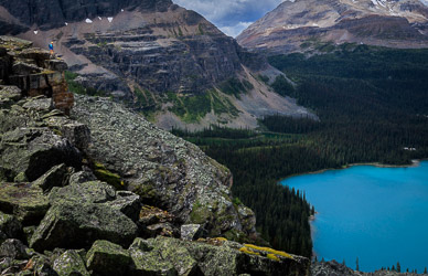 Yukness Ledges hiker (upper left) above Lake O'Hara