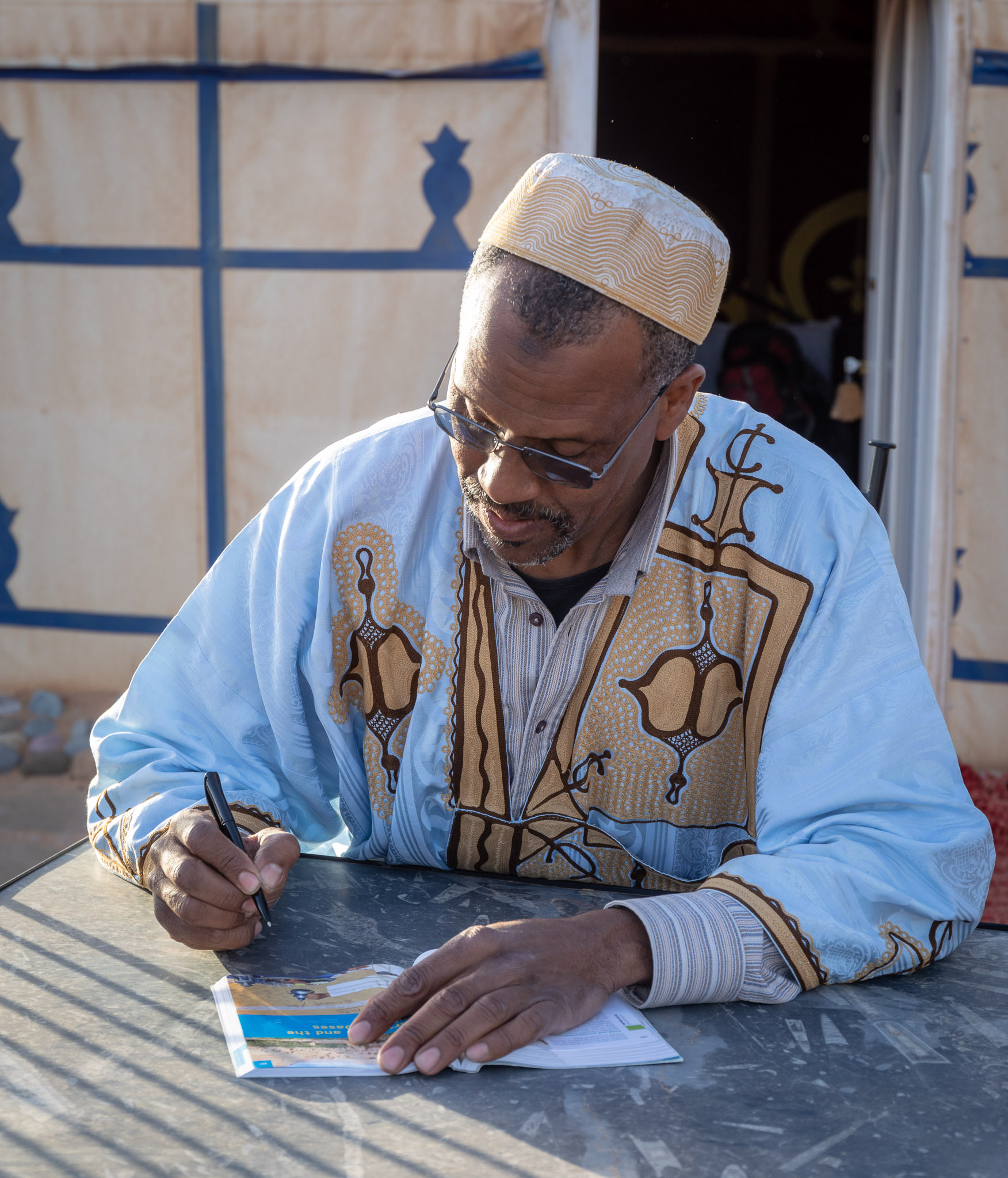 Tata autographing his Moon Guide picture