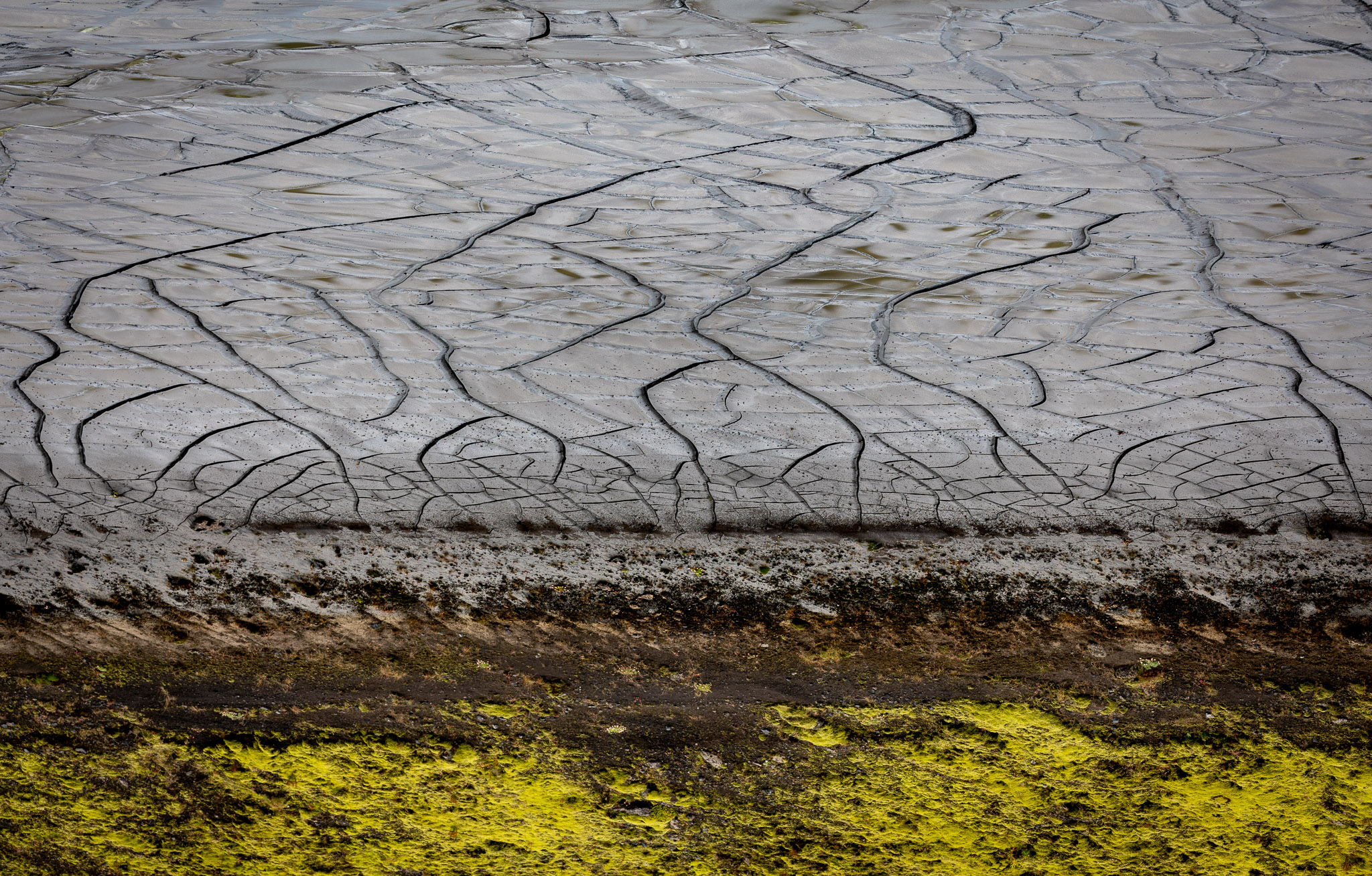 Cracked Mud at Sveinstindur Mountain Hut