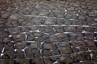 Cracked Mud at Sveinstindur Mountain Hut