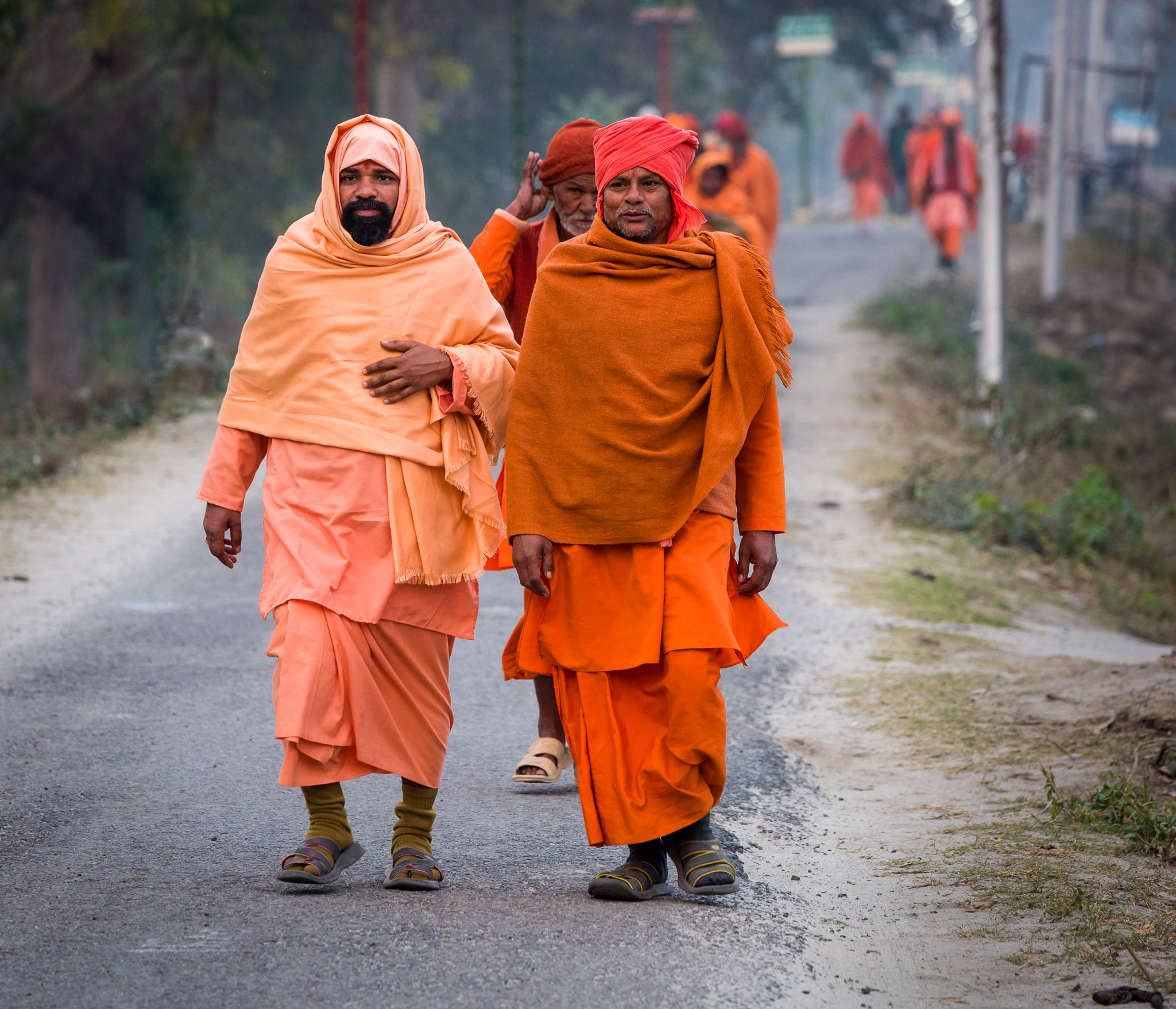 Sadhus walking to evening meal