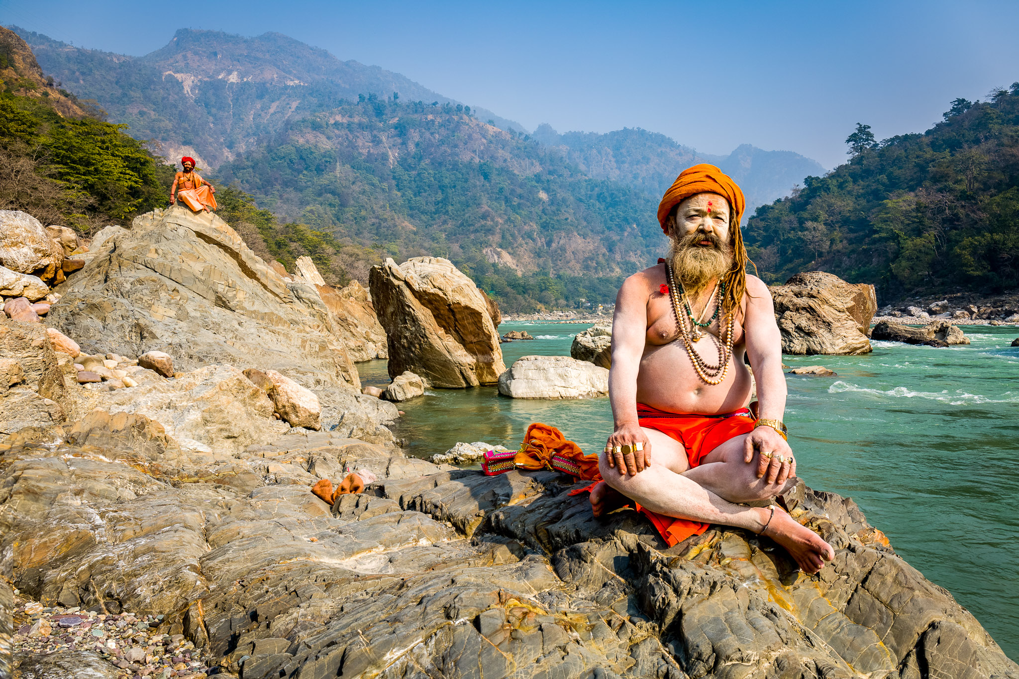 Sadhus on the Ganges emerging from the Himalaya