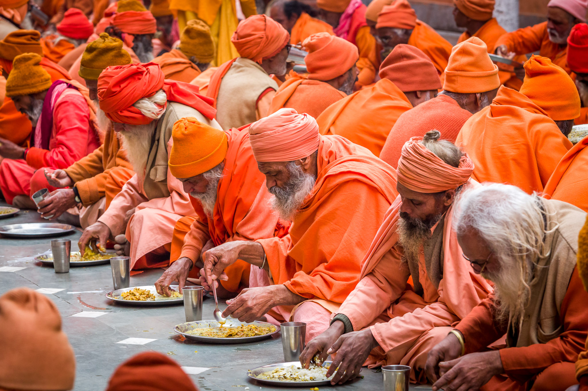 Sadhus served their evening meal