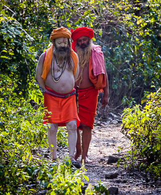 Sadhus hiking to waterfall