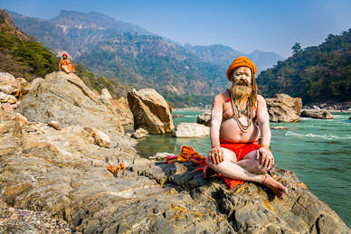 Sadhus on the Ganges emerging from the Himalaya