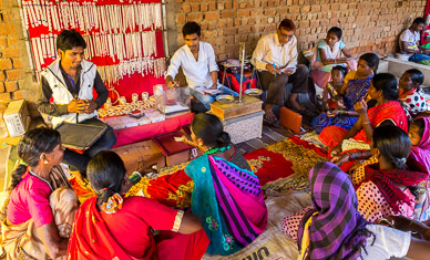 Extended family helping purchase silver jewelry at Dudhawa market (for bride?)