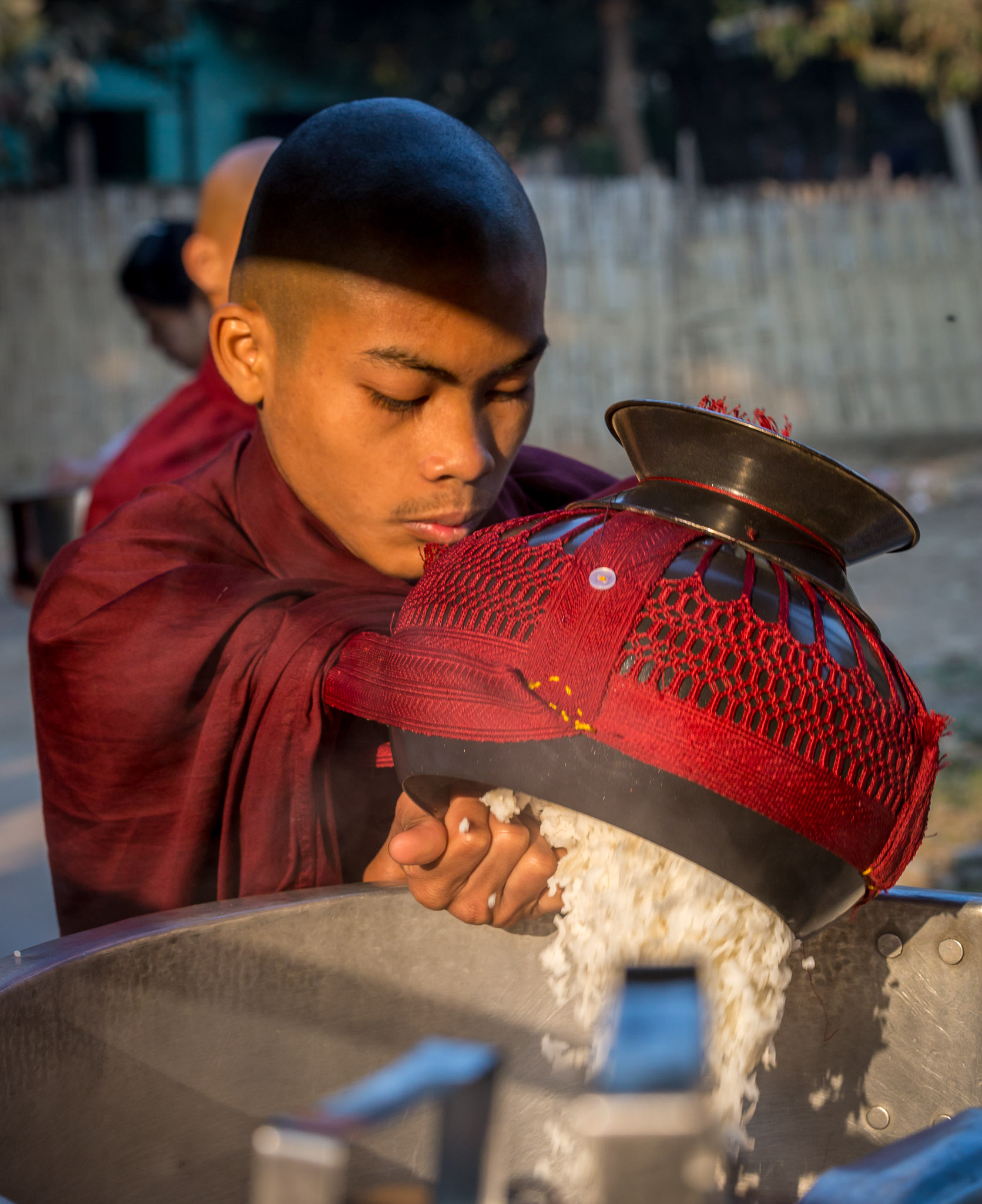 Emptying collected alms into support vehicle