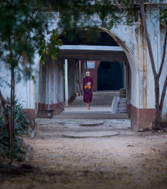 Leaving monastery for morning alms collection