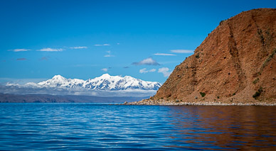 Point of Isla de la Luna, with the Andes'  Cordillera Real in background