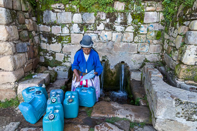 Collecting water at Yumani 's Sacred Springs, Isla del Sol