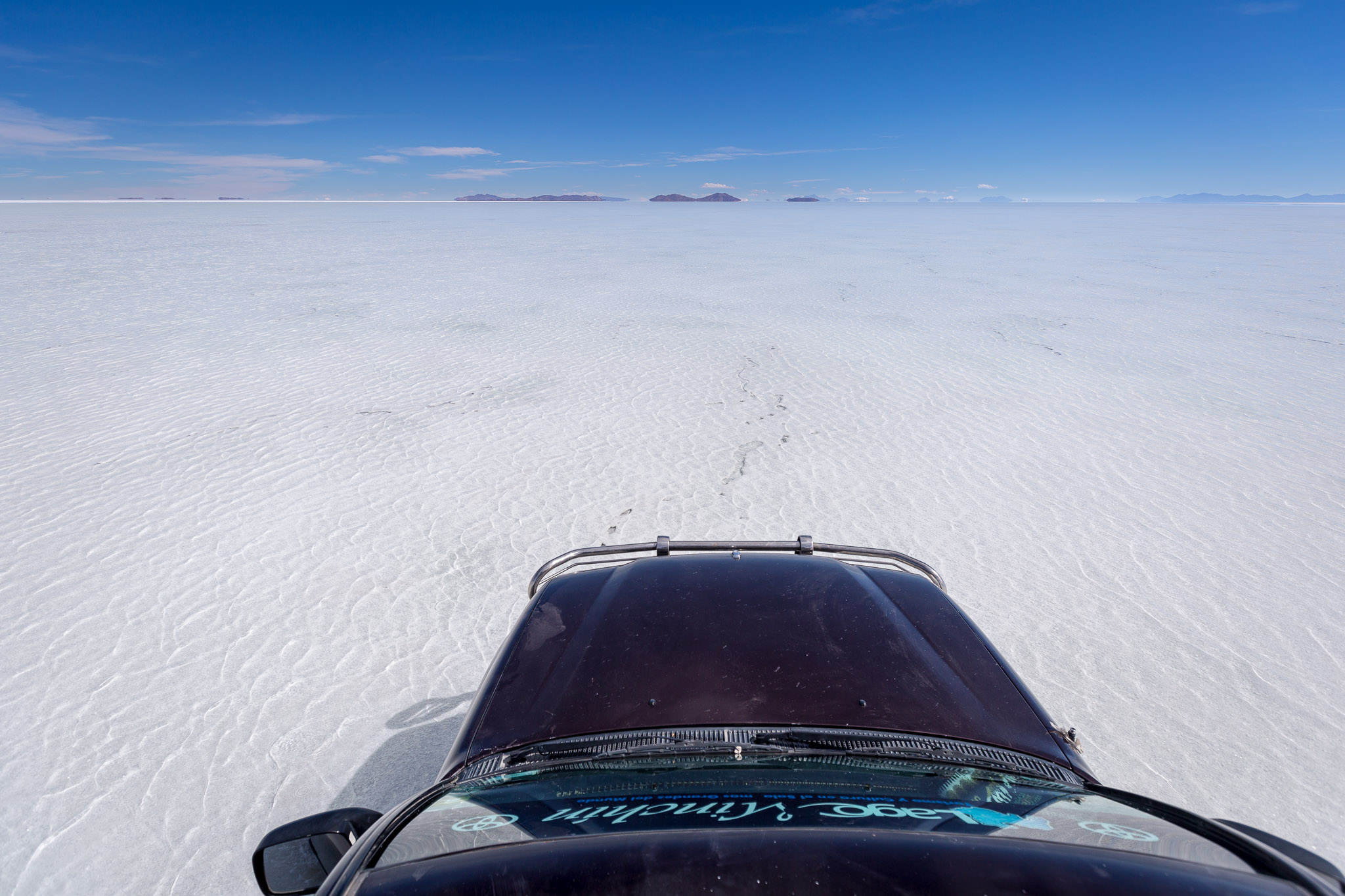 Driving on Salar de Uyuni