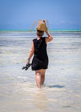 Walking from Zanzibar Rock Restaurant (tide coming in)