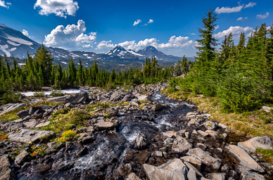 Stream above Golden Lake; Middle & North Sister in distance