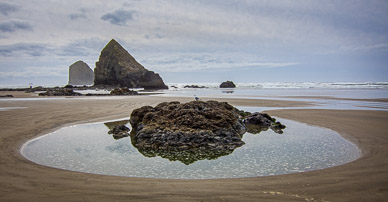 Pool with Jockey Cap Rock in background. Arcadia Beach, Oregon Coast