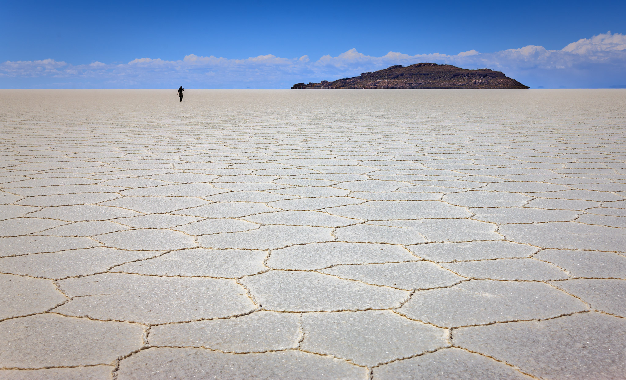 Reynaldo walking to Isla Incahuasi, Salar de Uyuni