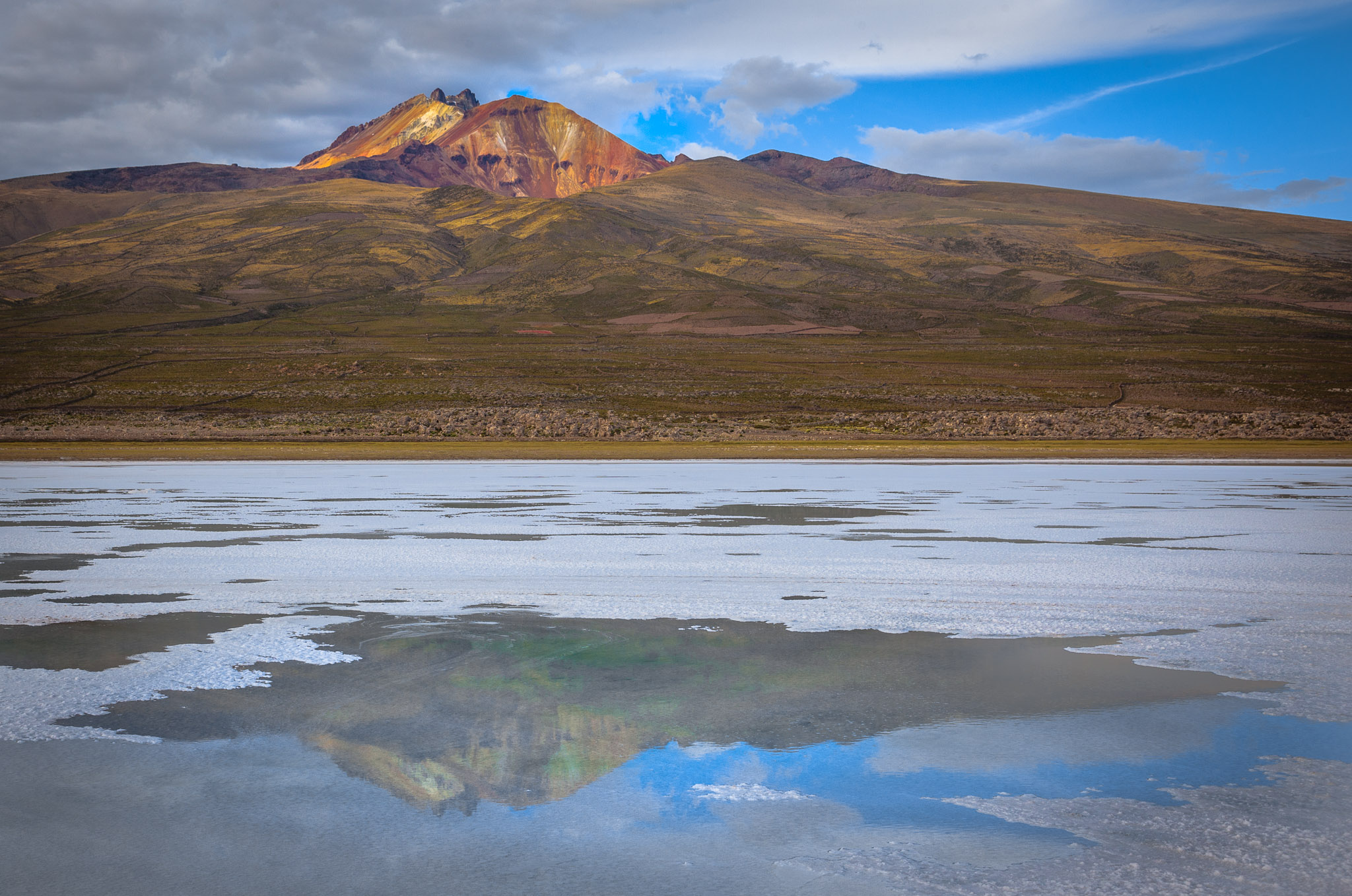 Volcan Tunupa reflected in Salar de Uyuni