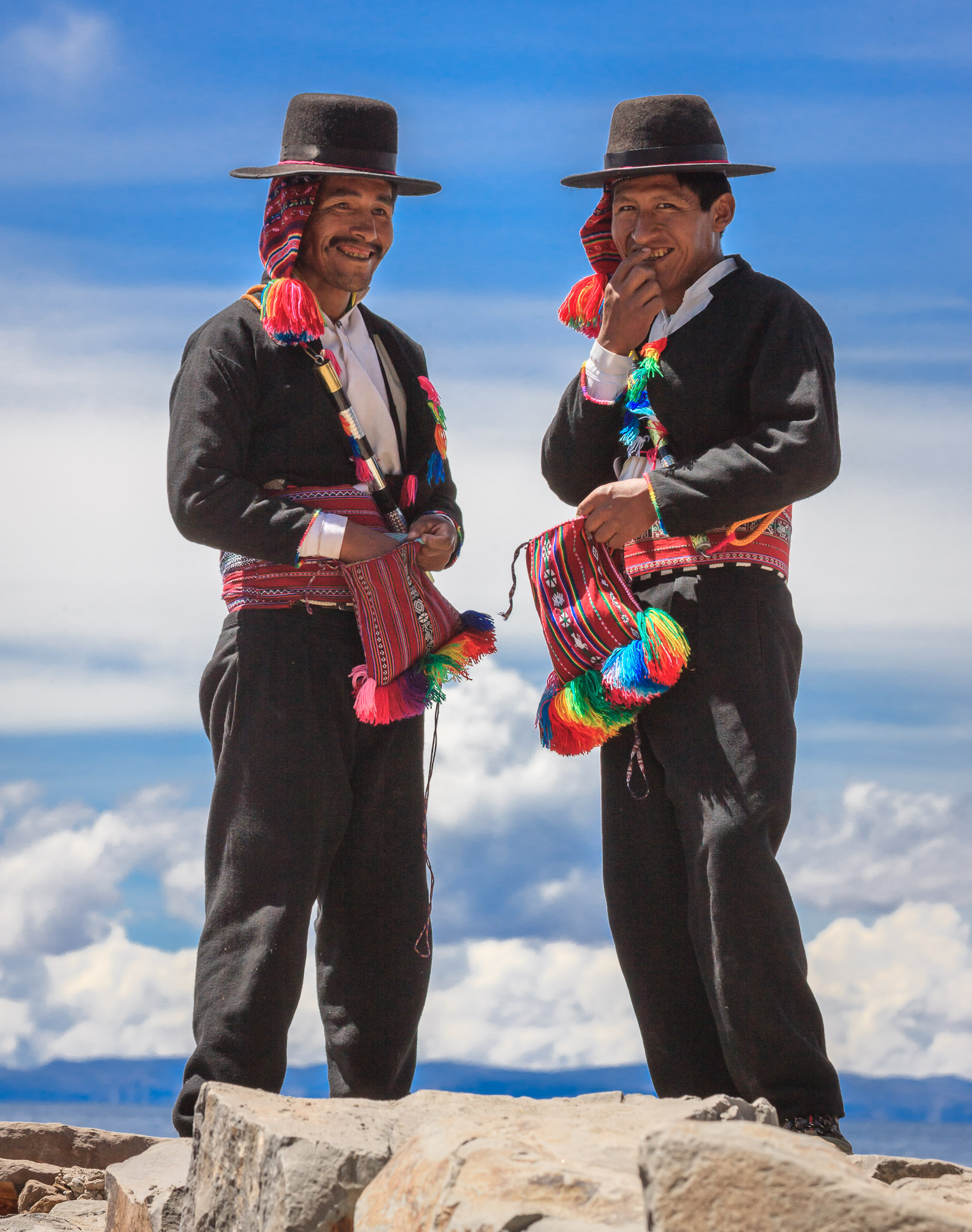 Men chewing coca leaves on Isla Taquile, Lake Titicaca