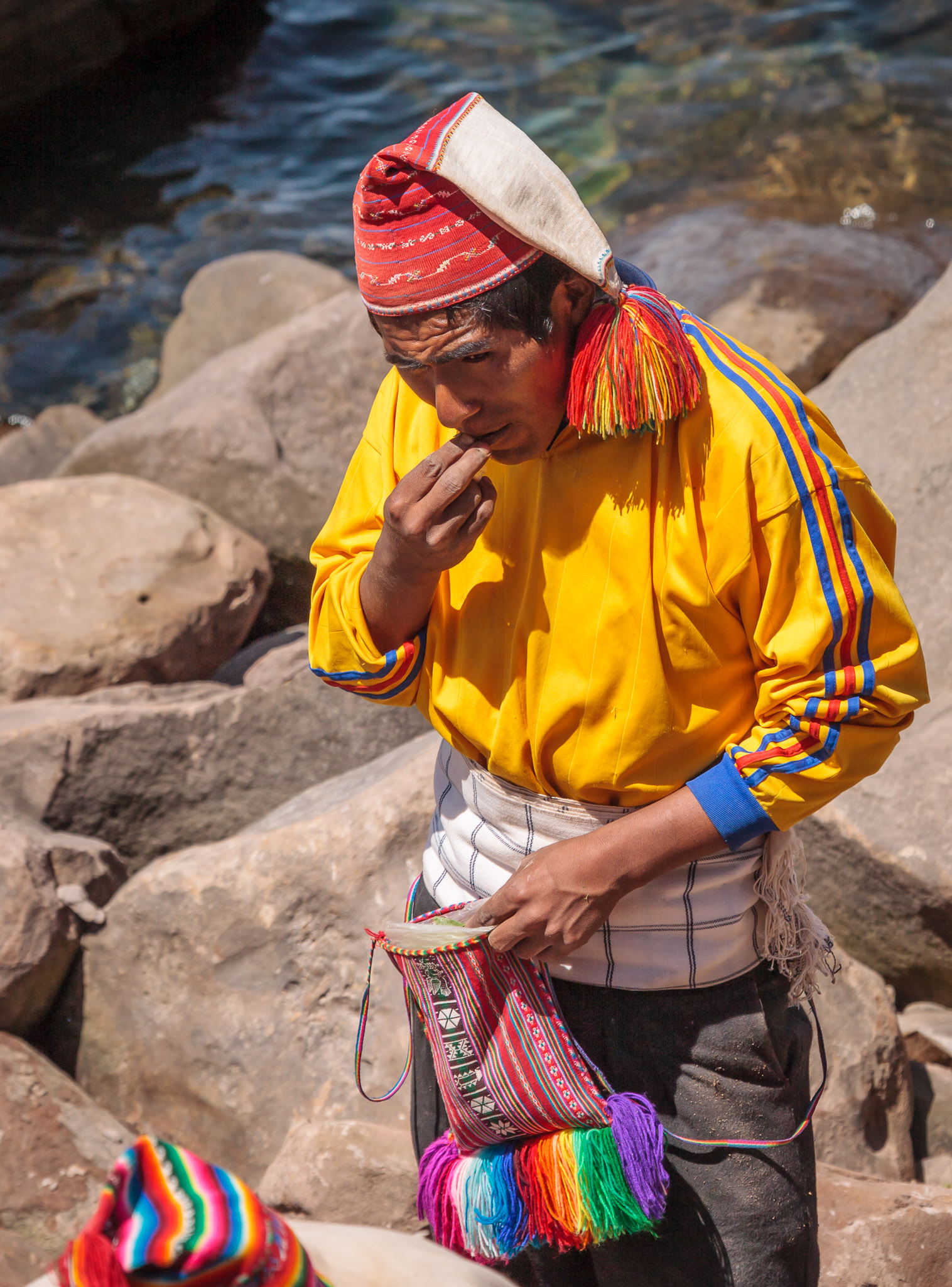 Men chewing coca leaves on Isla Taquile
