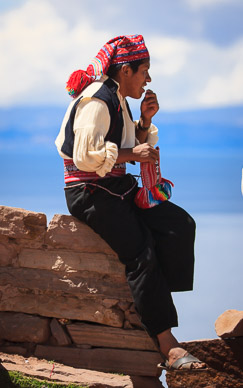 Men chewing coca leaves on Isla Taquile
