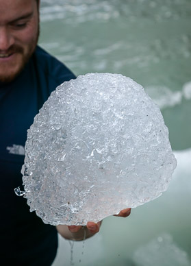 Alex holding small iceberg