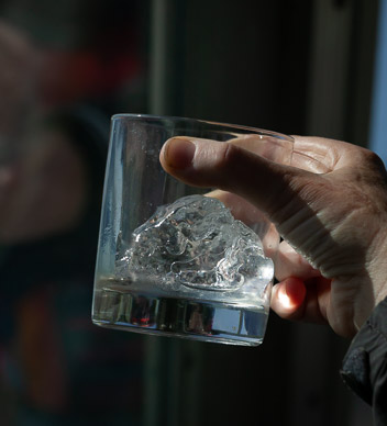 Enjoying Piso Sour on ferry (1000s of years old icecube)