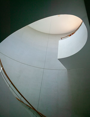 Central staircase between gravity fed levels