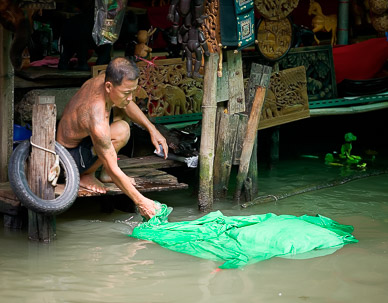 Woodcarver at Damnoen Saduak Floating Market