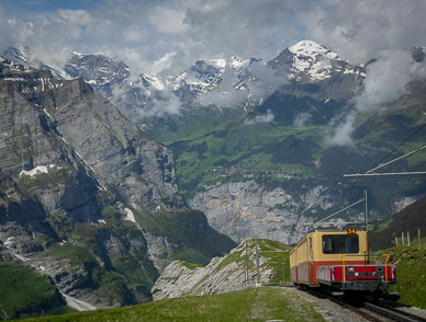 Cog railway down other side from Kleine Scheidegg to Lauterbrunnen valley (Mürren in distance)