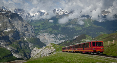 Cog railway down other side from Kleine Scheidegg to Lauterbrunnen valley (Mürren in distance)