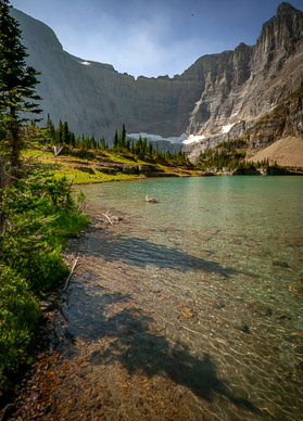 Shoreline of unnamed lake below Iceberg Lake, Glacier National Park