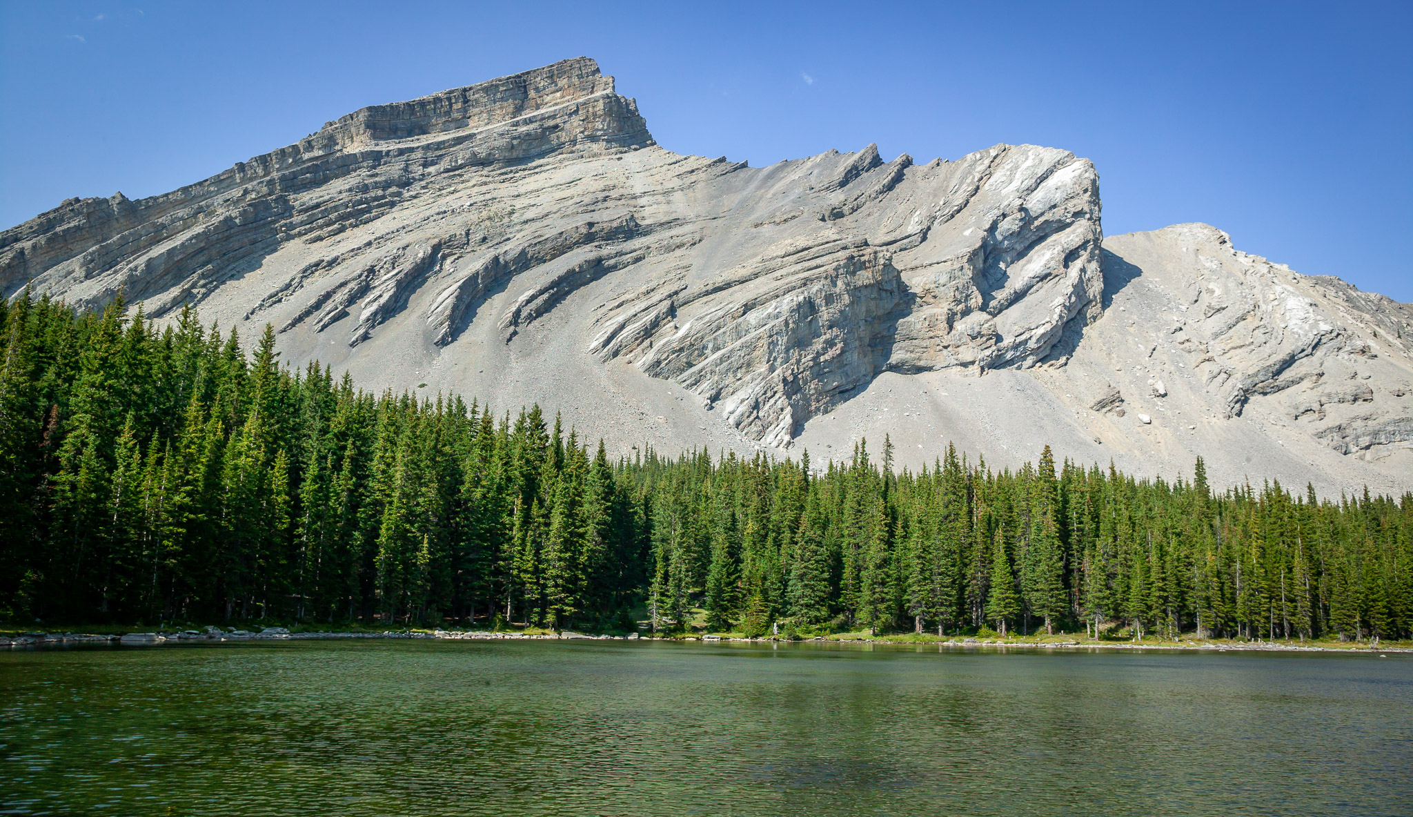 Highwood Range above one of the middle Pickle Jar Lakes Alberta