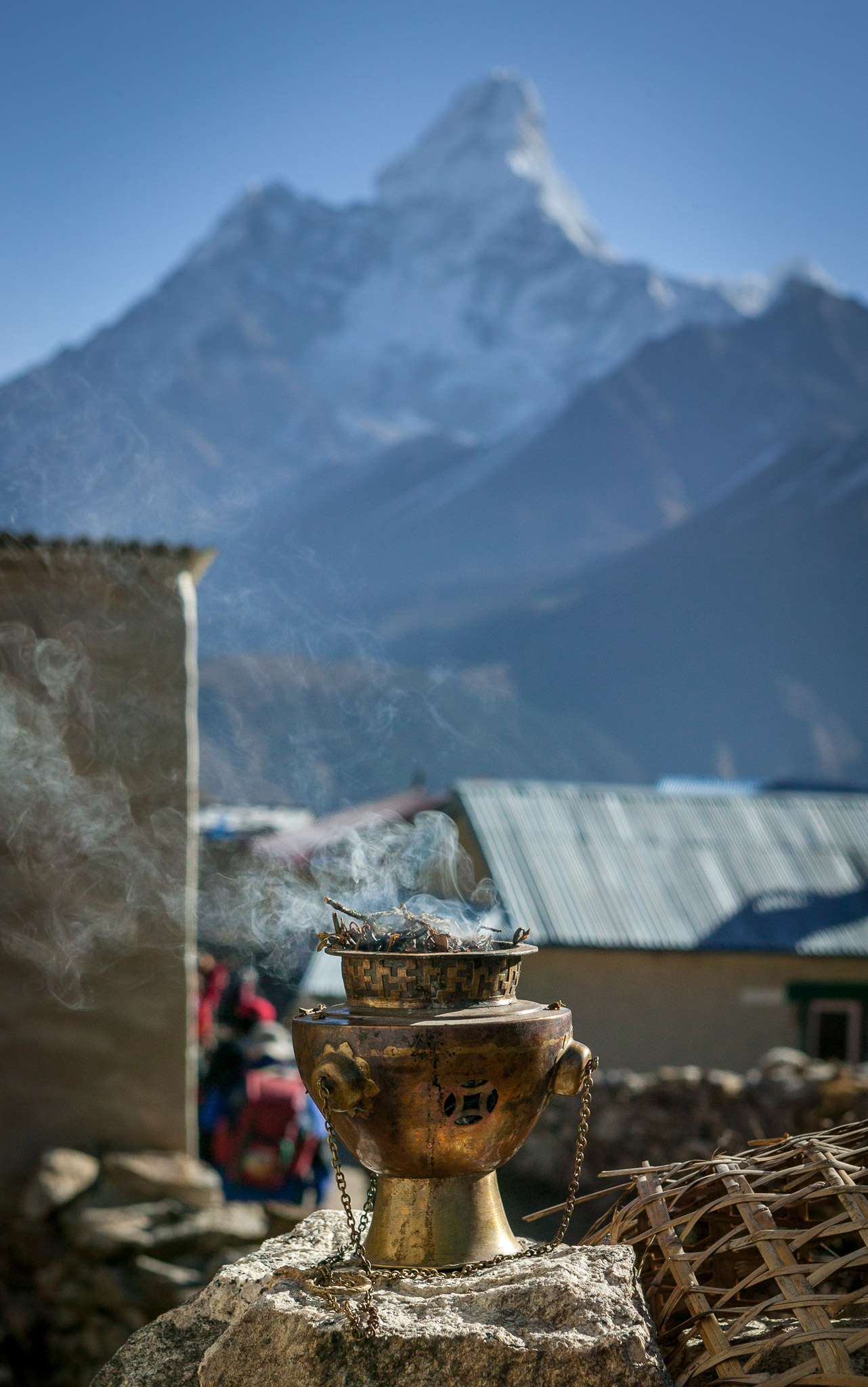 Morning offering, with Ama Dablam behind