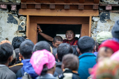 Lining up to receive holy water & dough ball