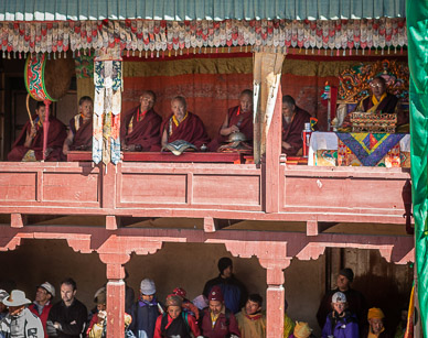 Abbot & monks watching Dance of the Masks